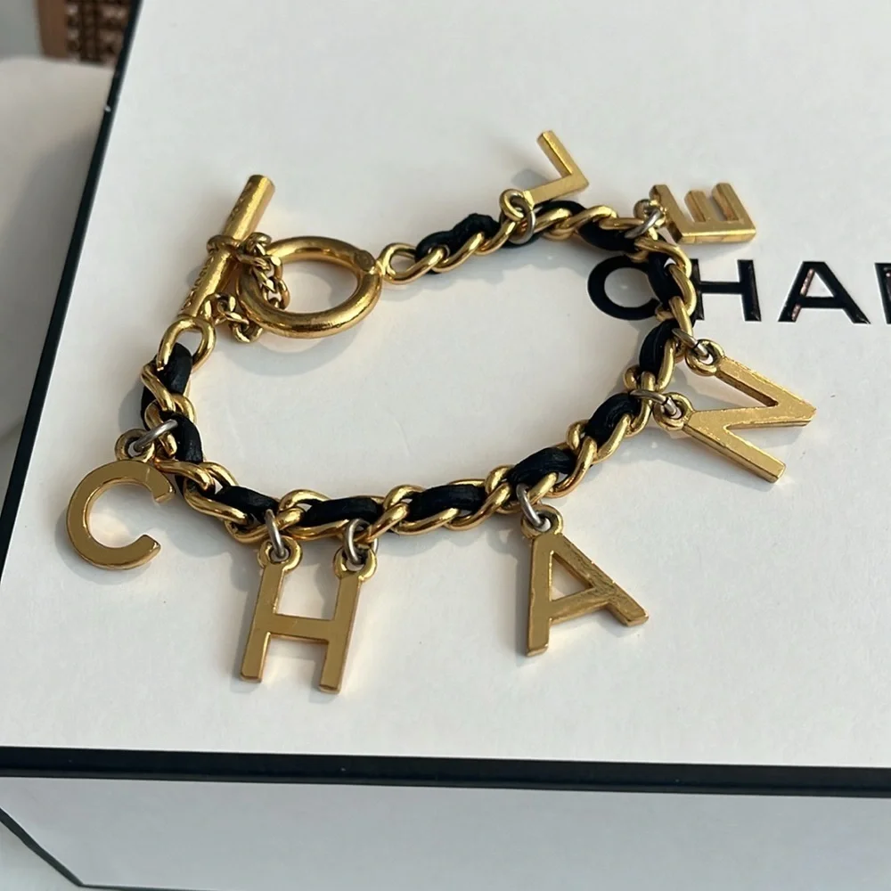 CHANEL RARE VINTAGE TOGGLE LEATHER CHARM BRACELET